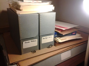 Blue Clamshell Boxes Filled with Records of the Van Wyck family in the Hudson Valley, and Sergeant Clinton Peterson.